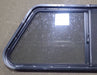 Used Slanted Black Radius Opening Window : 41 3/4" W x 17 3/4" H x 1 7/8" D - Young Farts RV Parts