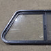 Used Slanted Black Radius Opening Window : 41 3/4" W x 17 3/4" H x 1 7/8" D - Young Farts RV Parts