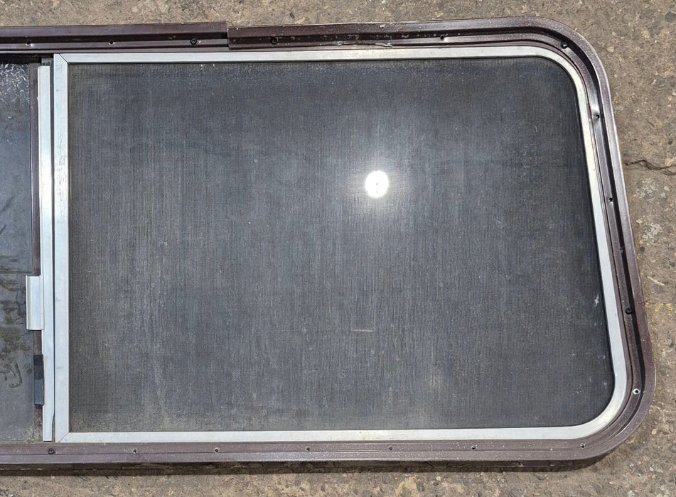 Used Slanted Brown Radius Opening Window : 55 1/2" W x 19 3/4" H x 1 1/4" D