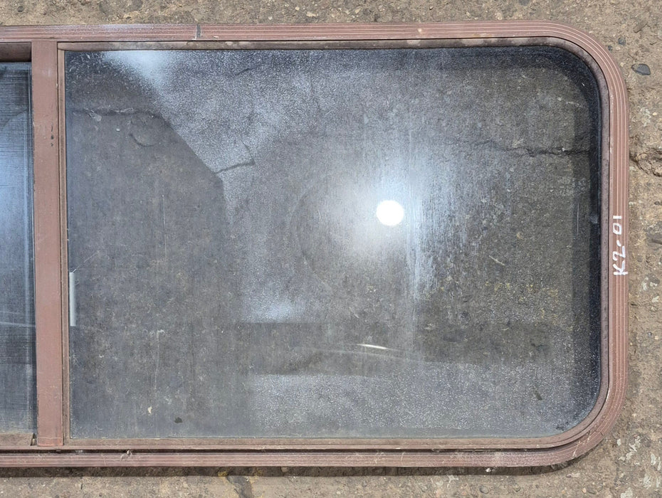 Used Slanted Brown Radius Opening Window : 55 1/2" W x 19 3/4" H x 1 1/4" D