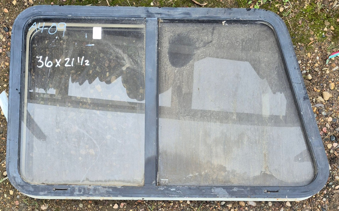 Used Slanted White Radius Opening Window : 35 3/4" W x 21 1/4" H x 1 7/8" D - Young Farts RV Parts