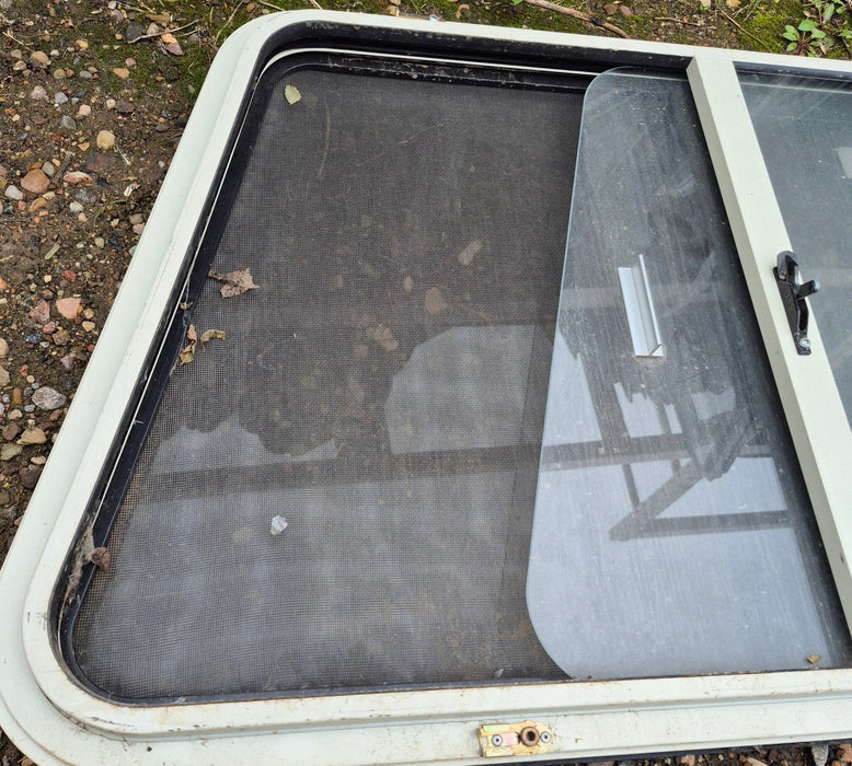 Used Slanted White Radius Opening Window : 35 3/4" W x 21 1/4" H x 1 7/8" D - Young Farts RV Parts