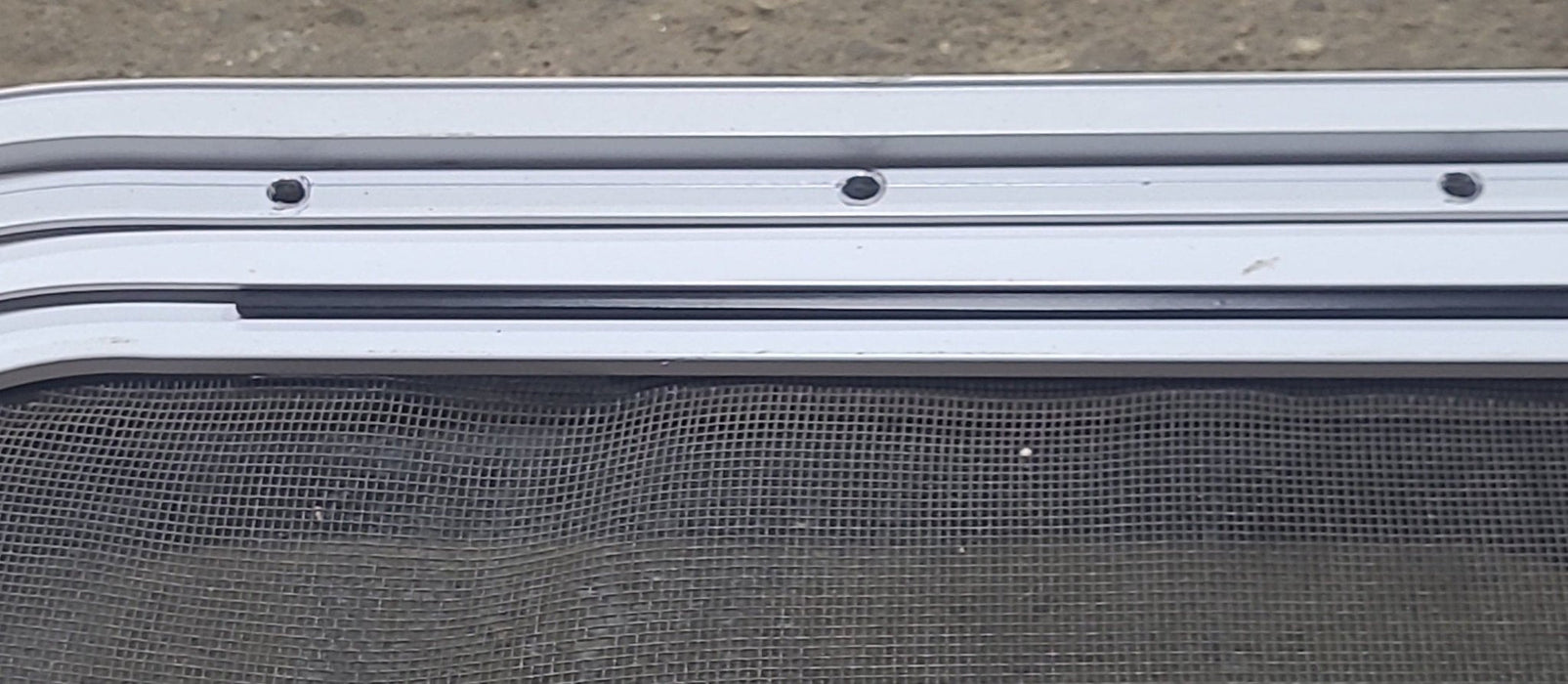 Used Slanted White Radius Opening Window : 41 1/2" W X 21 1/2" H X 1 1/4" D - Young Farts RV Parts