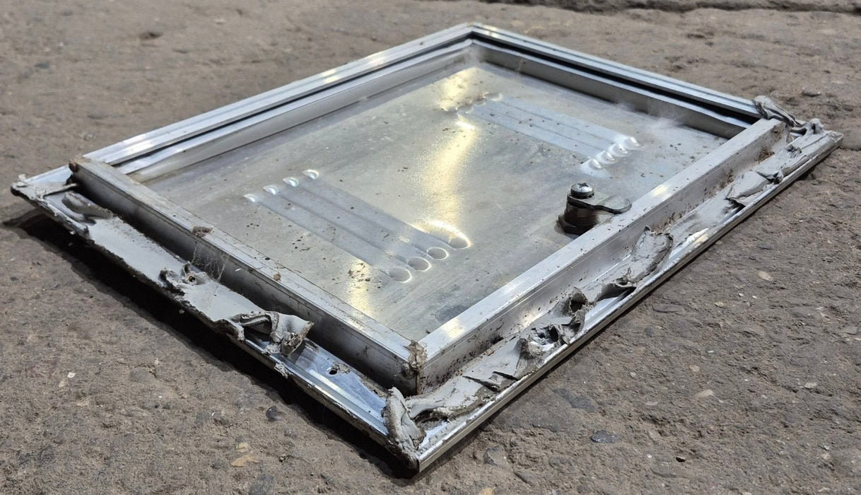 Used Square Cornered Battery/ Propane Cargo Door 13 3/4" x 10 3/4" x 1/2"