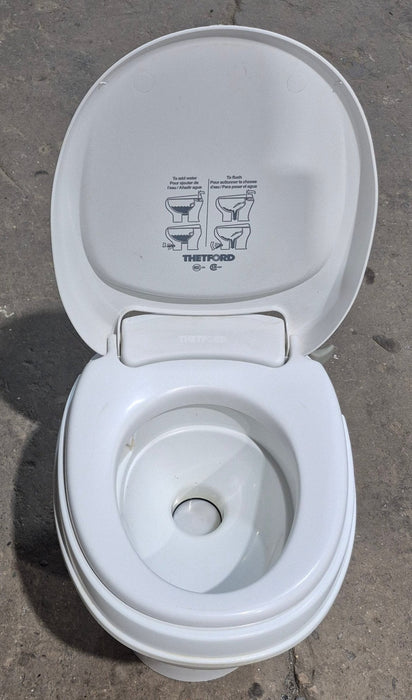 Used Thetford Toilet, Hand Flush, High Profile, White - AQUA MAGIC V , 31648
