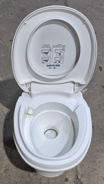 Used Thetford Toilet, Hand Flush, High Profile, White - AQUA MAGIC V , 31648