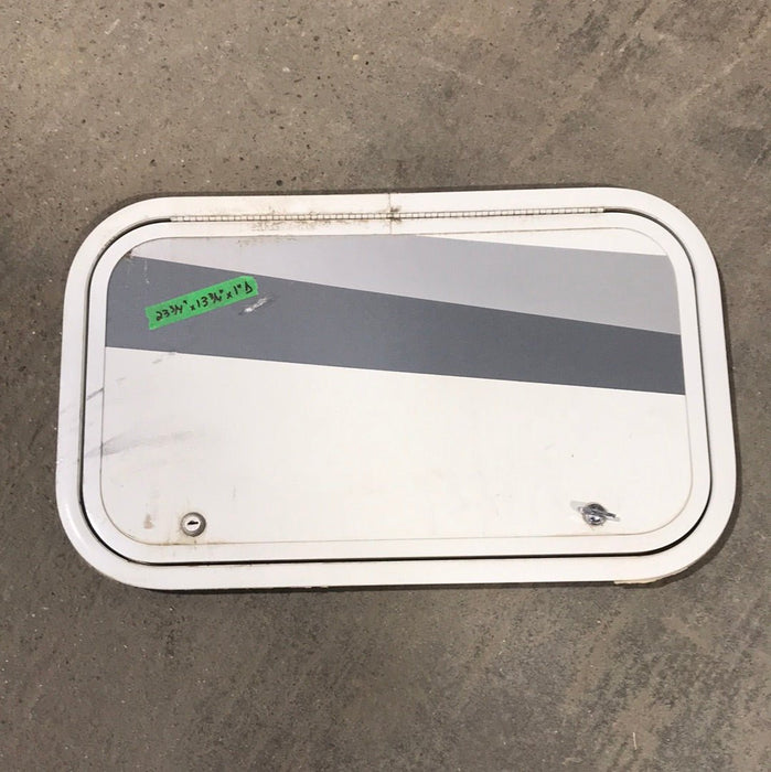 Used White Corner radius cargo door  23 3/4" W x 13 3/4" H x 1"D