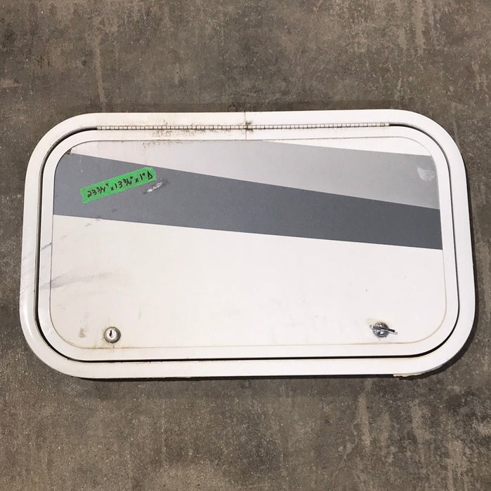 Used White Corner radius cargo door  23 3/4" W x 13 3/4" H x 1"D