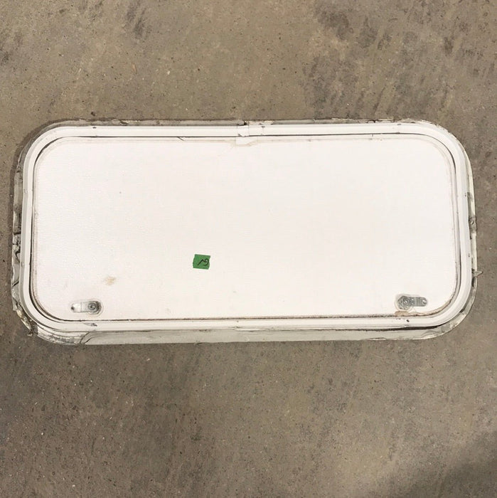 Used White Corner radius cargo door  29 3/4" W x 13 3/4" H x 1"D