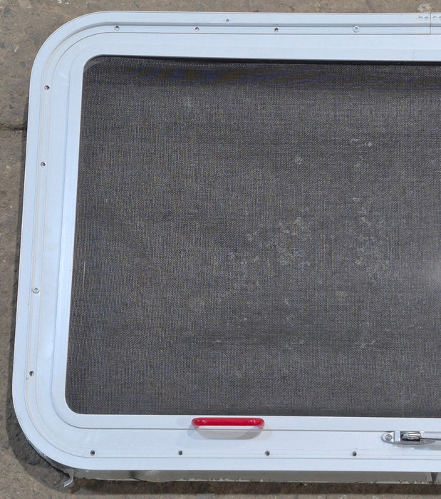 Used White Radius Emergency Opening Window : 35 1/4" W x 21 1/4" H x 1 7/8" D - Young Farts RV Parts