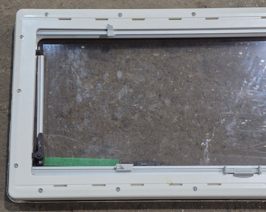 Used White Radius Emergency Opening Window : 46 5/8" W x 18 3/4" H x 1 1/8" D - Young Farts RV Parts