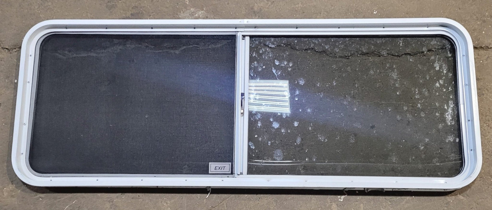 Used White Radius Emergency Opening Window : 60 1/4" W x 21 3/4" H x 1 7/8" D
