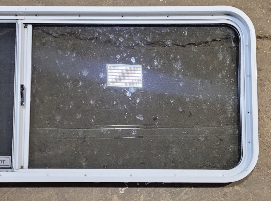 Used White Radius Emergency Opening Window : 60 1/4" W x 21 3/4" H x 1 7/8" D