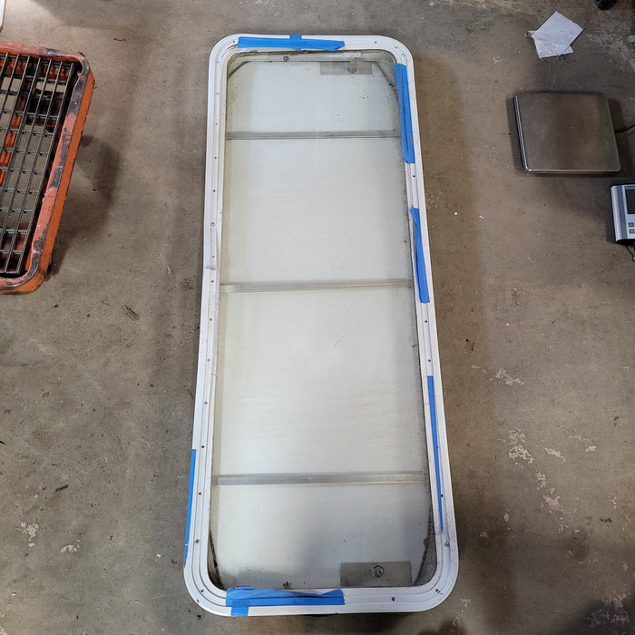 Used White Radius Non-Opening Window With Rock Guard Cover : 59 1/2  X 21  X 2" D