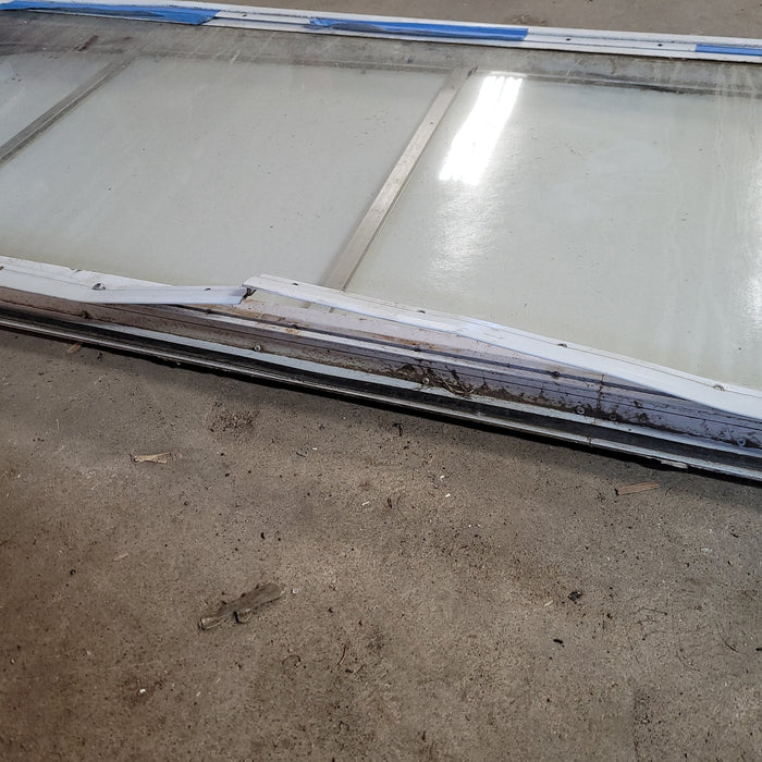 Used White Radius Non-Opening Window With Rock Guard Cover : 59 1/2  X 21  X 2" D