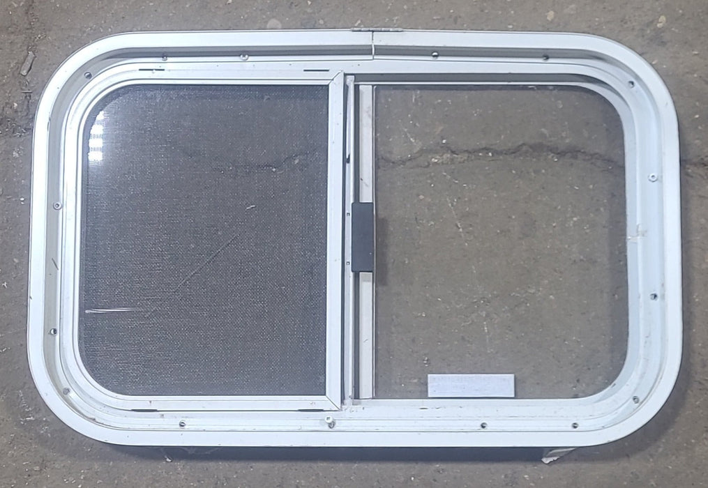 Used White Radius Opening Window : 23 1/2" W x 14 1/2" H x 1 7/8" D - Young Farts RV Parts