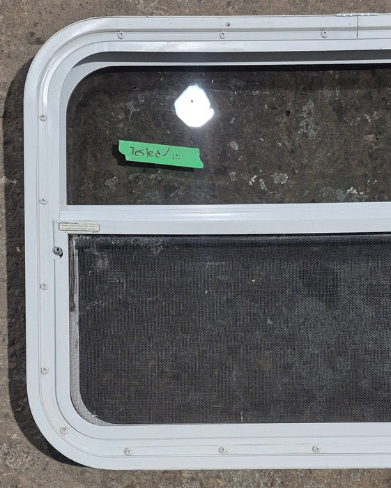 Used White Radius Opening Window : 29 1/2" W x 19 1/4" H x 1 7/8" D - Young Farts RV Parts