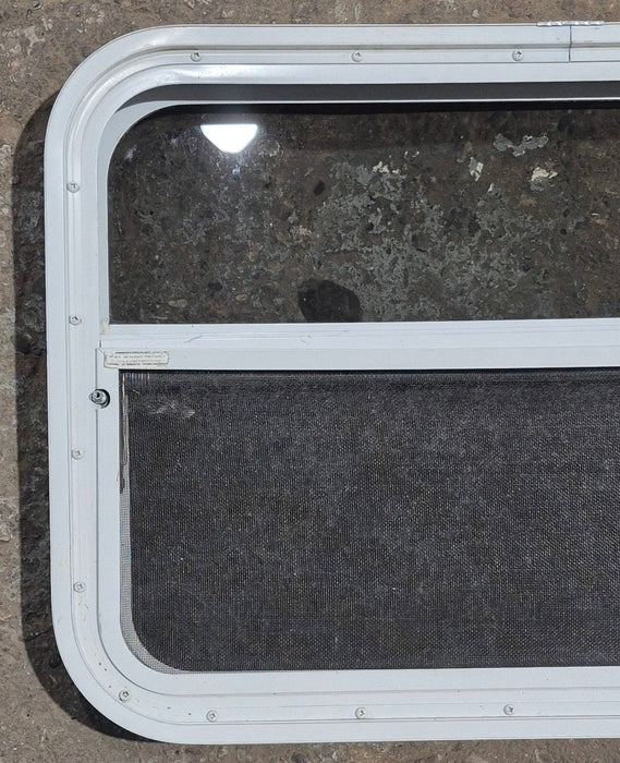 Used White Radius Opening Window : 29 1/2" W x 19 1/4" H x 1 7/8" D - Young Farts RV Parts