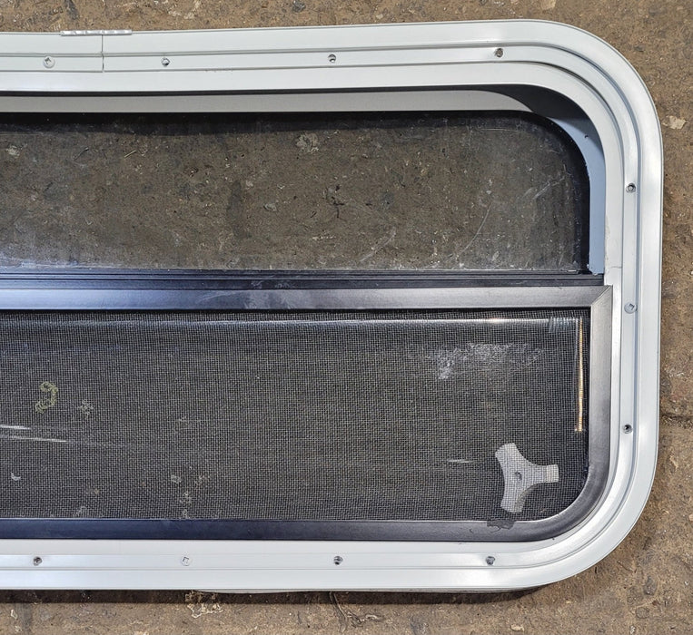 Used White Radius Opening Window : 29 1/4" W x 14 1/4" H x 1 3/4" D